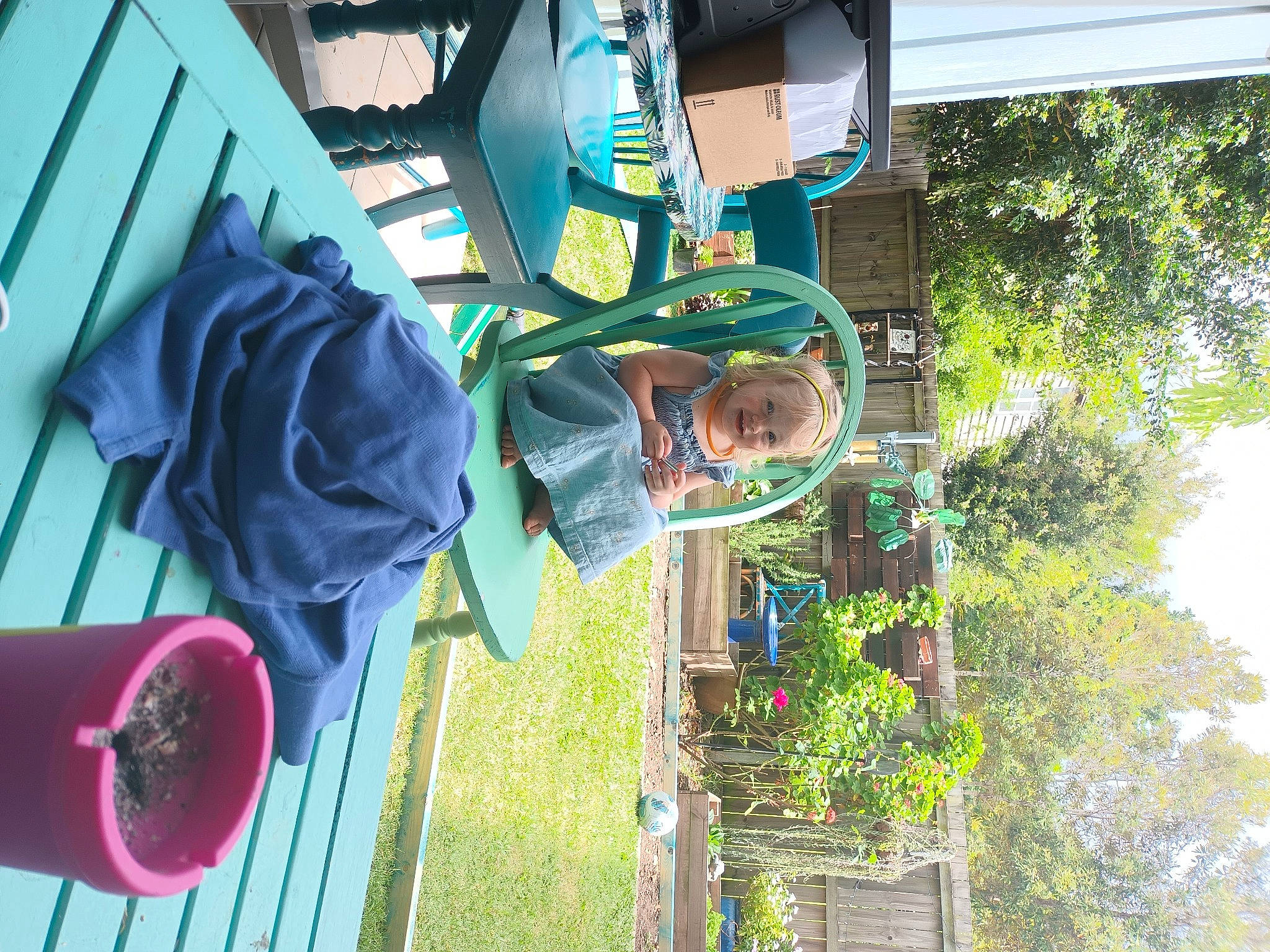 Hailey is registered to the contest to win money with this photo: carmine, facade, flower, fun, garden, grass, house, leisure, magenta, person, petal, plant, recreation, rose, rose_family, rose_order, toddler, tree