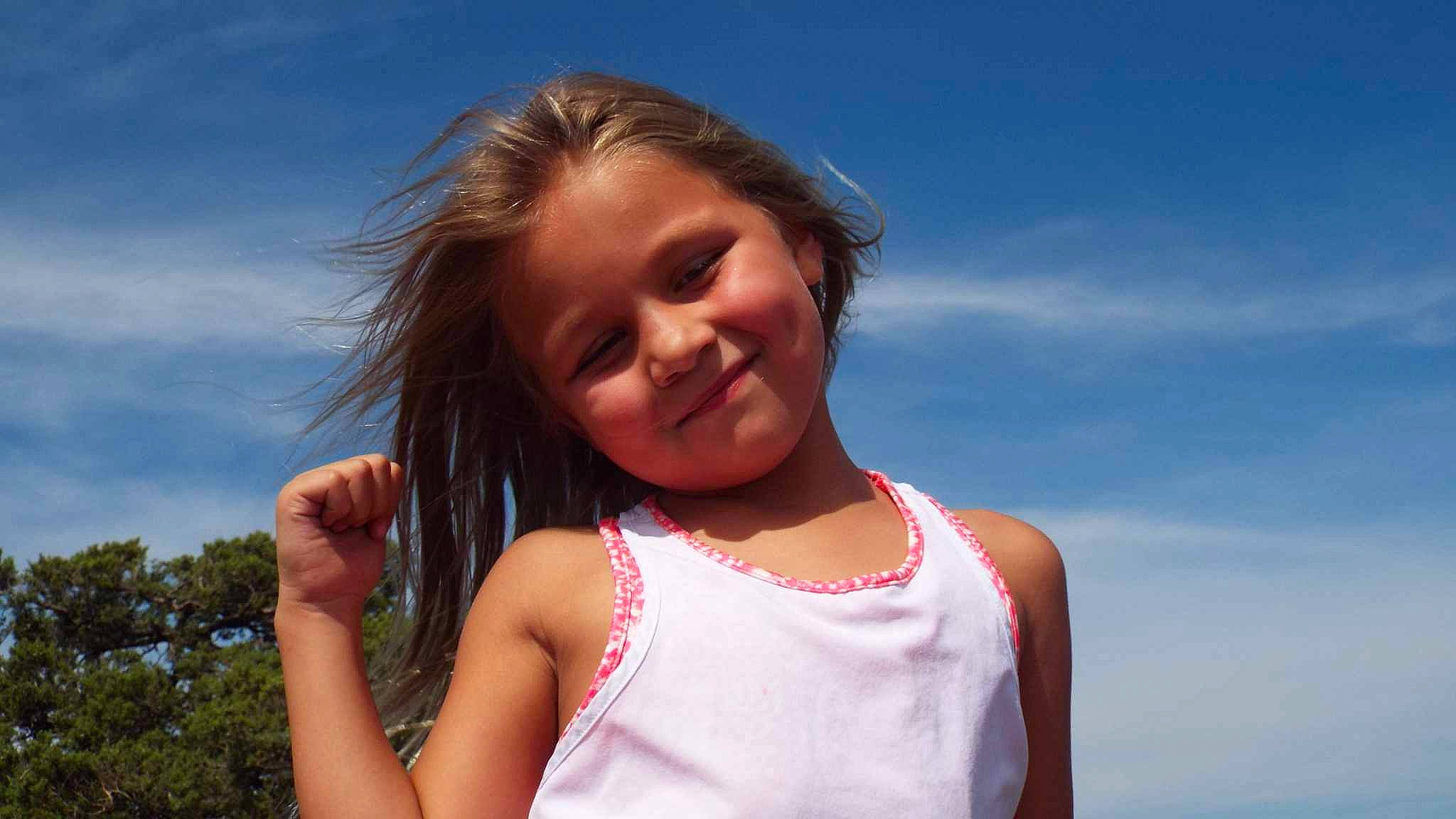 Aubie is registered to the contest to win money with this photo: cloud, elbow, face, facial_expression, flash_photography, gesture, hair, happy, head, joy, leisure, lip, long_hair, neck, people_in_nature, person, shoulder, skin, sky, smile