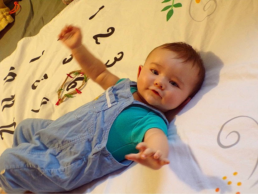 Leelon joined the competition — help win amazing prizes! baby, baby_toddler_clothing, bed, cheek, child, comfort, finger, fun, happy, leisure, linens, person, play, room, sitting, skin, sleeve, t_shirt, textile, toddler