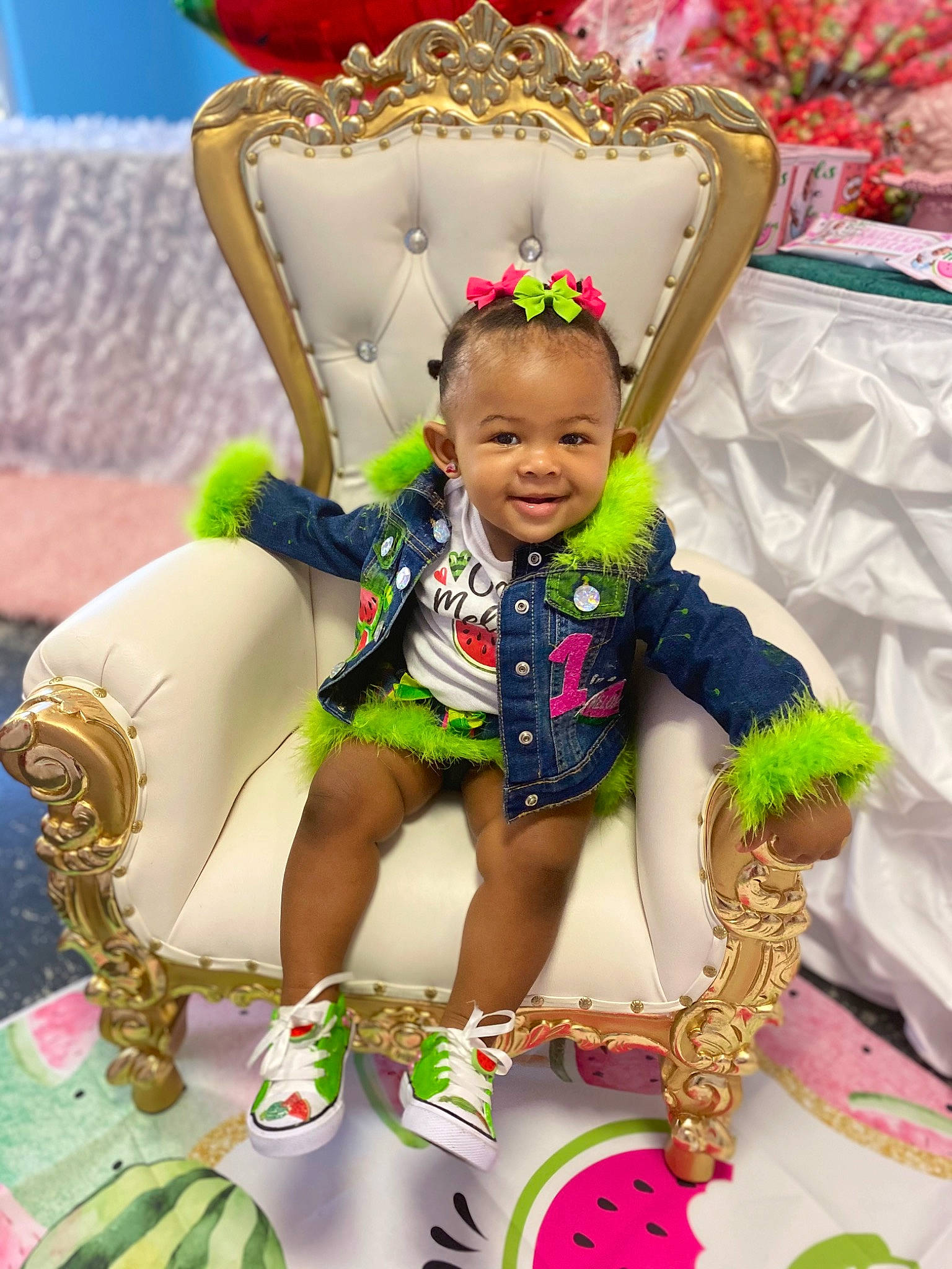 Kelis is registered to the contest to win money with this photo: baby, chair, child, entertainment, event, fashion_accessory, festival, fun, green, happy, head, jewellery, joy, leisure, person, recreation, shorts, smile, toddler, tradition