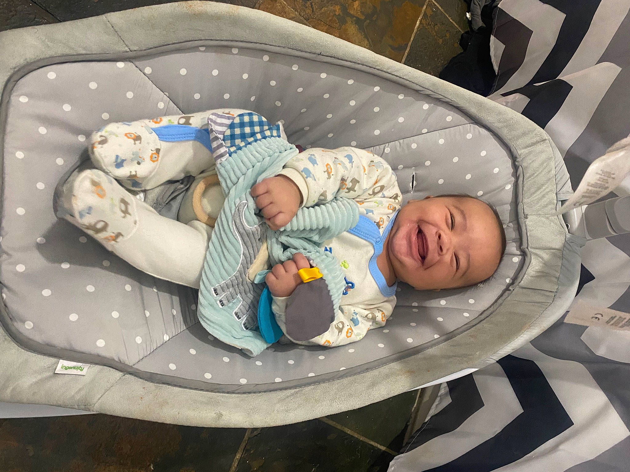 Lorenzo is registered to the contest to win money with this photo: baby, baby_products, baby_safety, baby_sleeping, baby_toddler_clothing, bedtime, child, circle, comfort, human_body, lap, linens, mammal, nap, pattern, person, room, sitting, sleep, smile