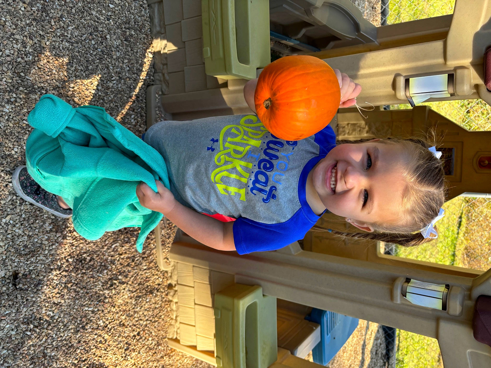Braelynn is registered to the contest to win money with this photo: baby_toddler_clothing, calabaza, child, cucurbita, electric_blue, fun, gourd, happy, hat, joy, leisure, orange, person, play, pumpkin, sitting, smile, soil, t_shirt, toddler