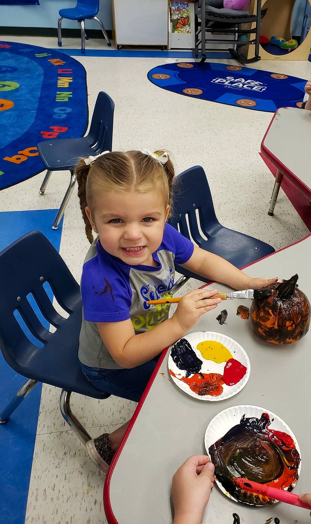 Braelynn is registered to the contest to win money with this photo: chair, child, comfort_food, cooking, cuisine, dessert, event, finger_food, food, fun, furniture, joy, leisure, person, plate, recipe, recreation, sitting, smile, table