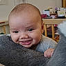 Jesse joined the competition — help win amazing prizes! baby, smile, crib, blanket, indoor, child, furniture, wooden, happy, face, hand, cozy, room, soft, infant, person, cute, baby_clothes, head, playful