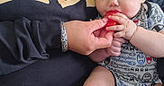Jesse joined the competition — help win amazing prizes! baby, background, casual, chair, child, clothing, drinking_cup, expression, face, foot, hand, holding, indoor, nail_polish, person, seated, skin, table, toy, woman