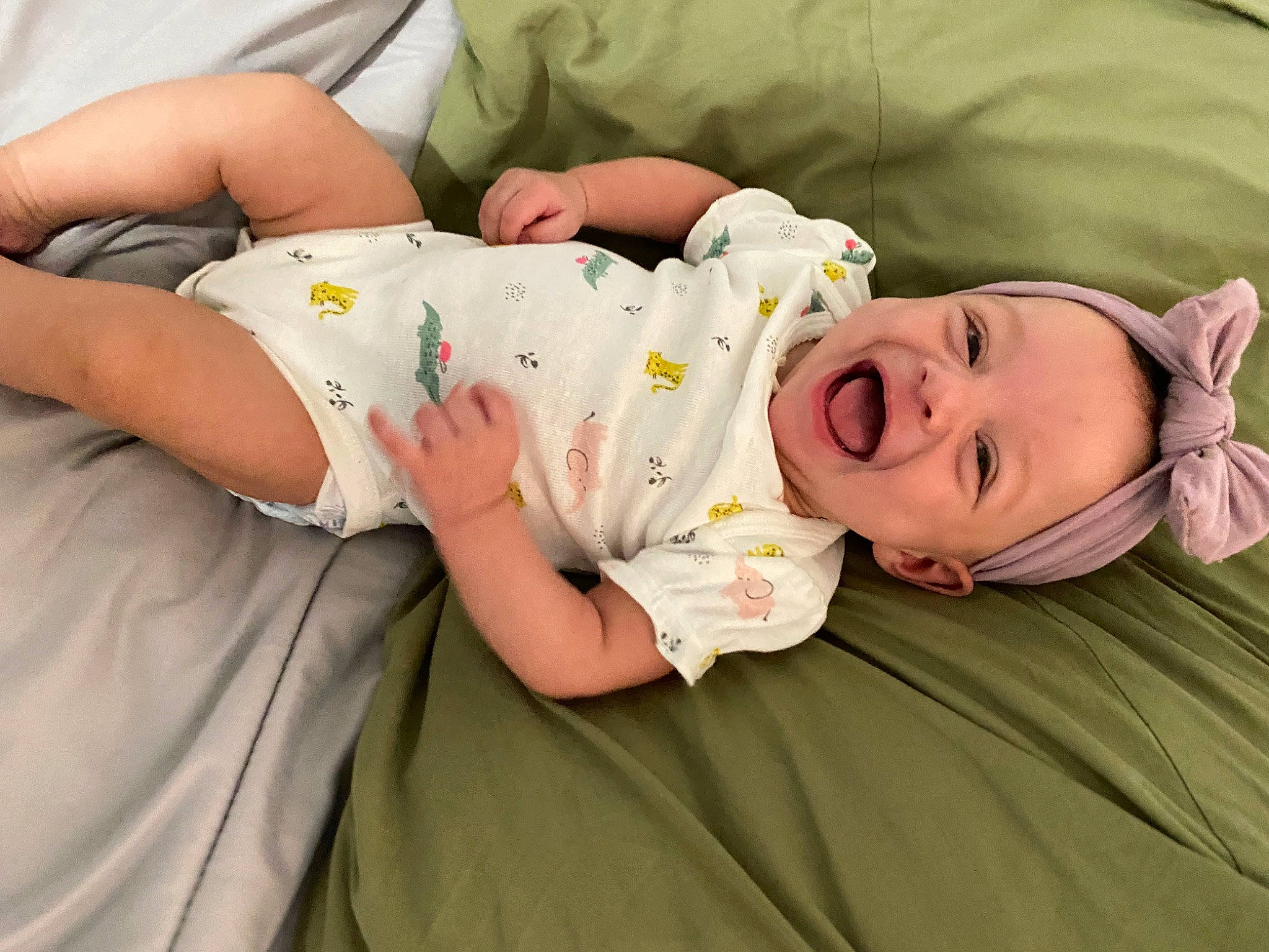 Ariyah is registered to the contest to win money with this photo: baby, baby_products, baby_sleeping, baby_toddler_clothing, cheek, child, comfort, elbow, eye, grass, happy, hat, head, headgear, linens, person, room, sitting, skin, smile