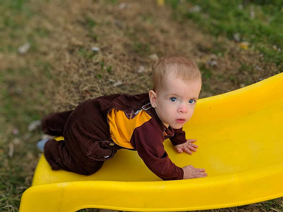 Alexander joined the competition — help win amazing prizes! child, fun, leisure, outdoor_play_equipment, person, play, playground, recreation, sitting, toddler, yellow