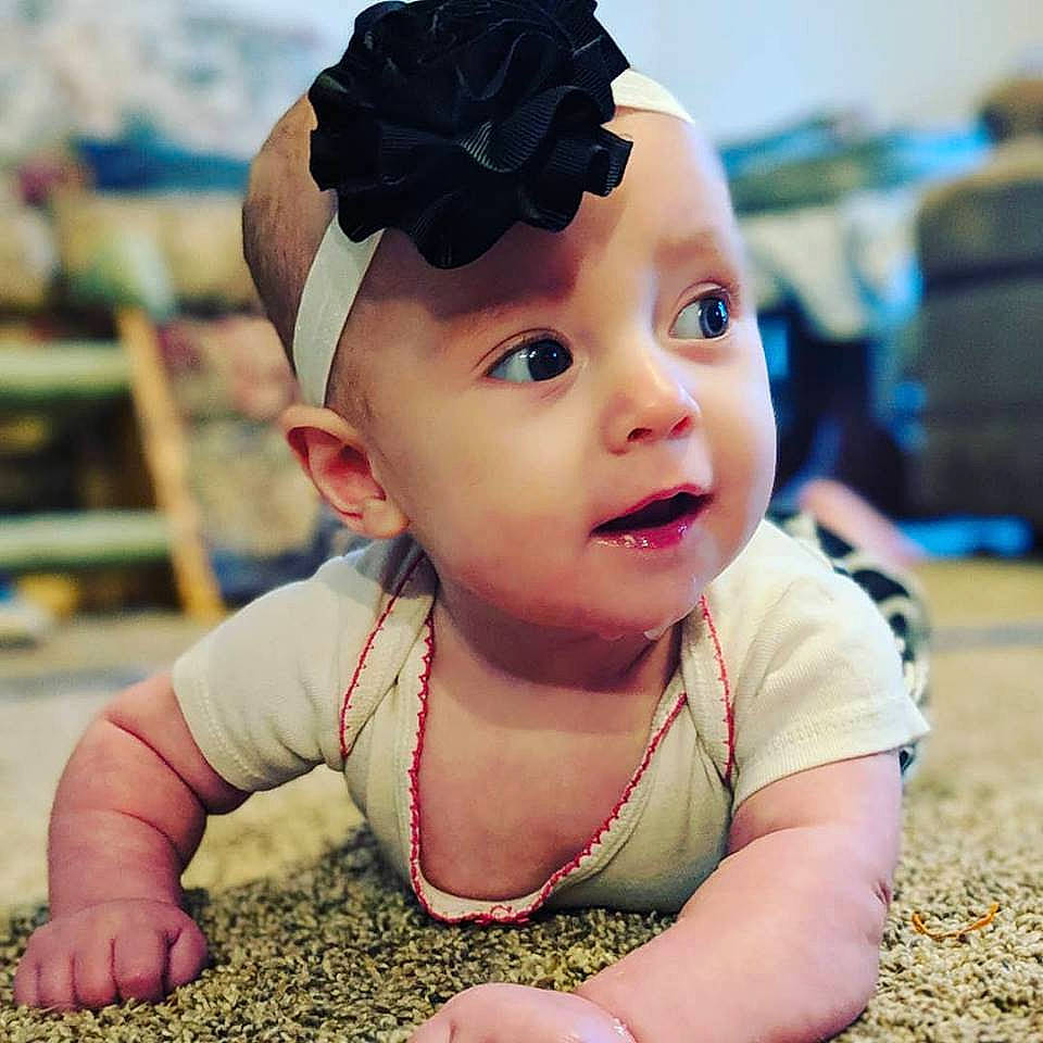 Lydia joined the competition — help win amazing prizes! baby, beauty, cheek, child, cool, ear, eye, face, fashion_accessory, forehead, grass, hair_accessory, hand, head, headband, headgear, person, skin, smile, snapshot