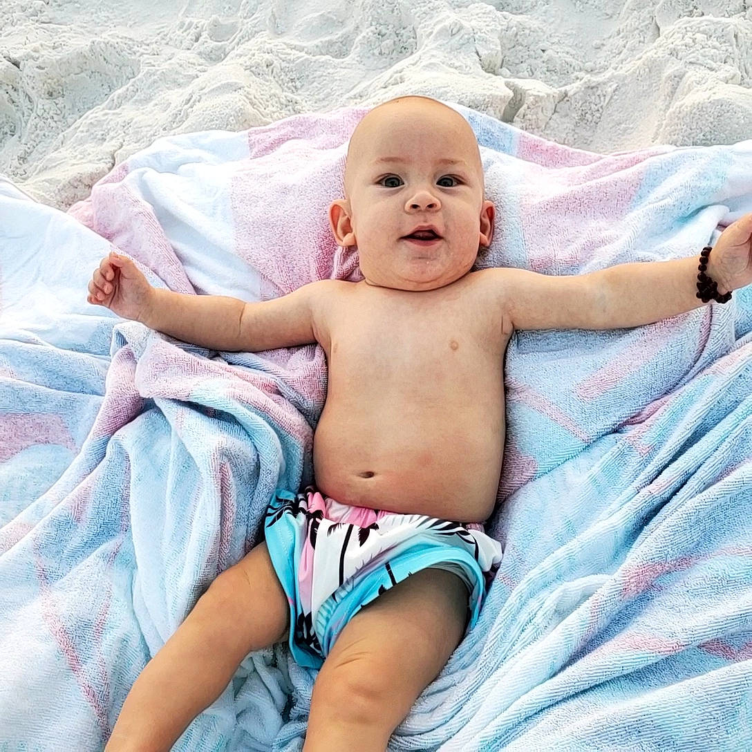 Beau is registered to the contest to win money with this photo: baby, baby_toddler_clothing, chest, comfort, eye, face, finger, happy, head, iris, leg, leisure, person, pink, shorts, skin, stomach, thigh, toddler, trunk