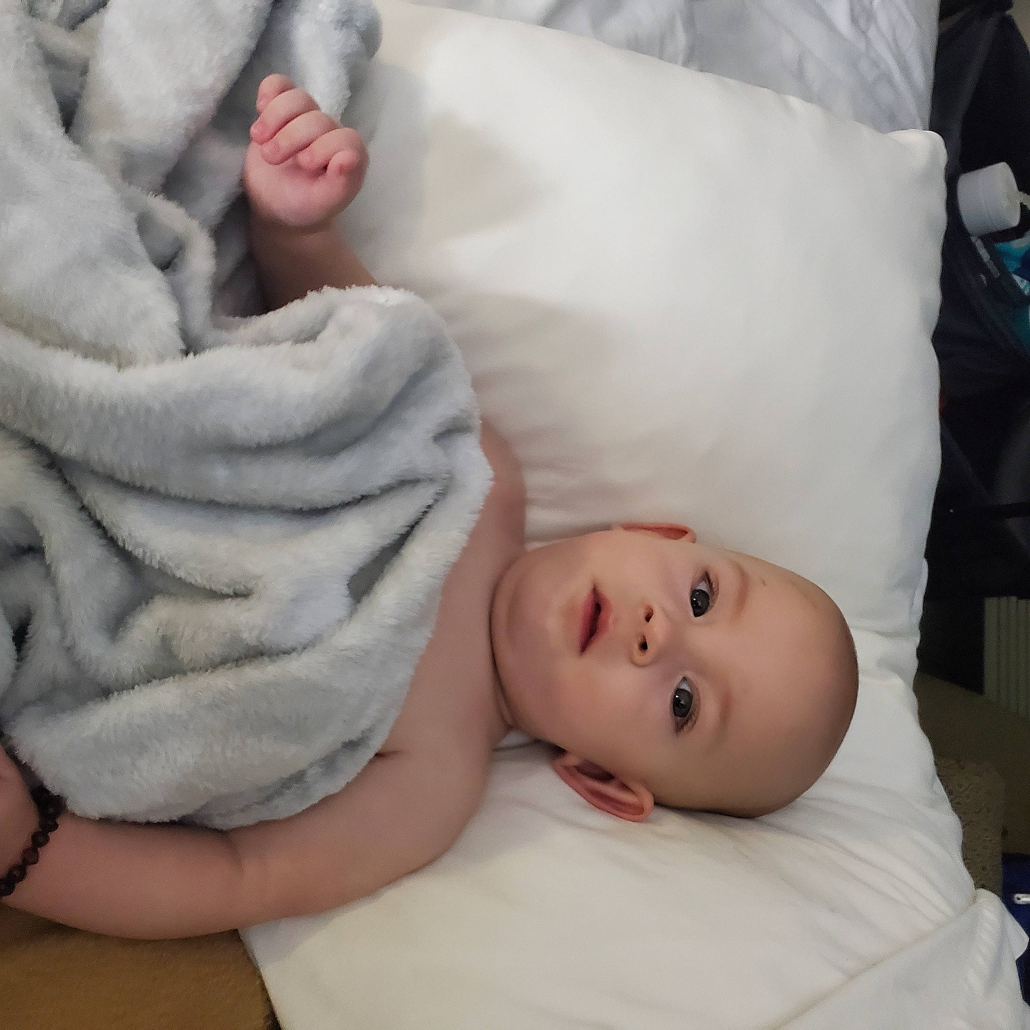 Beau is registered to the contest to win money with this photo: baby, baby_products, baby_safety, baby_sleeping, baby_toddler_clothing, bedding, cheek, child, comfort, finger, fur, head, linens, person, portrait_photography, room, skin, sleeve, thumb, toddler