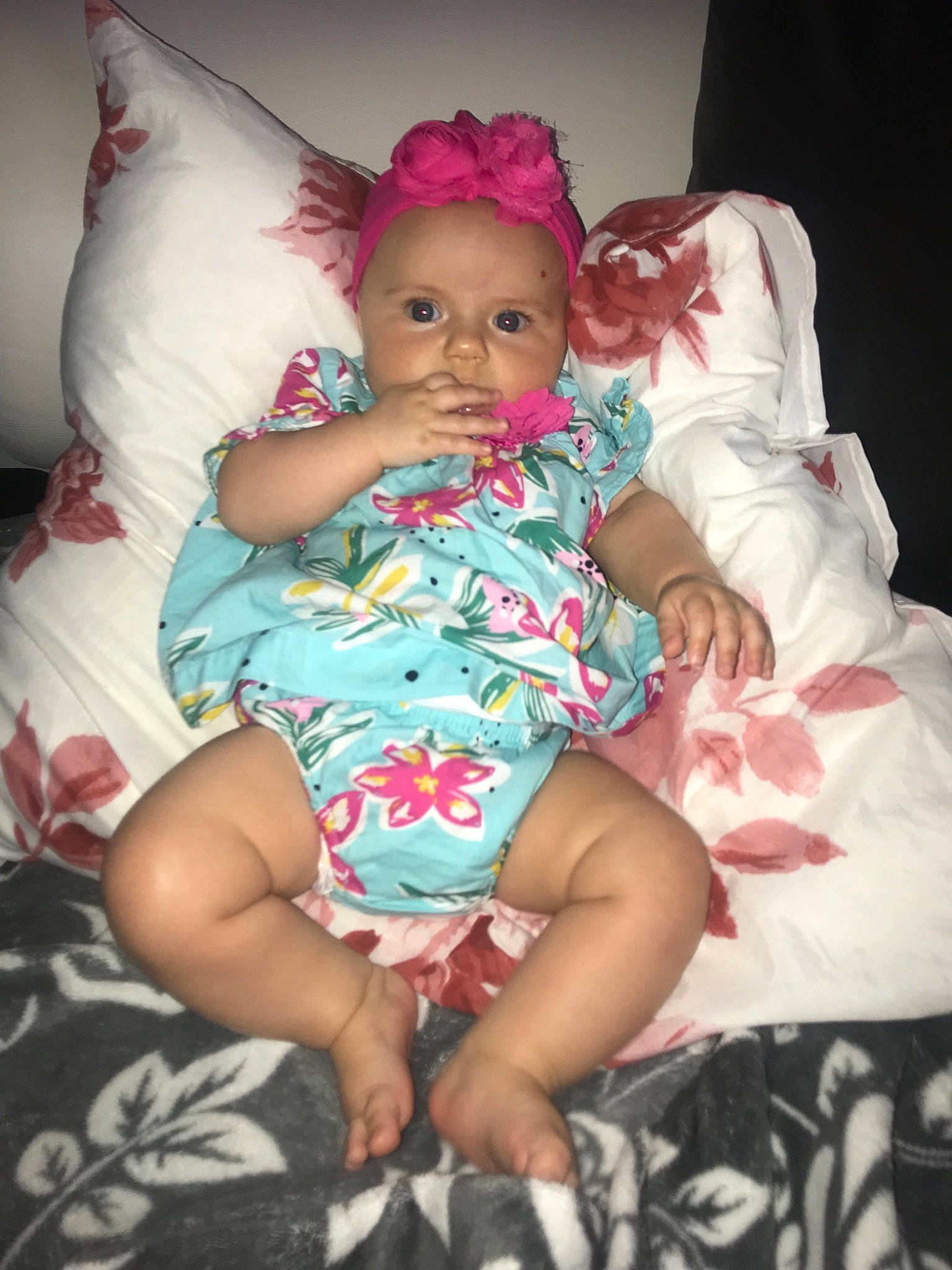 Mya participe au concours pour gagner de l'argent avec cette photo : baby, cheek, child, eye, furniture, head, lip, person, pink, sitting, skin, smile, toddler