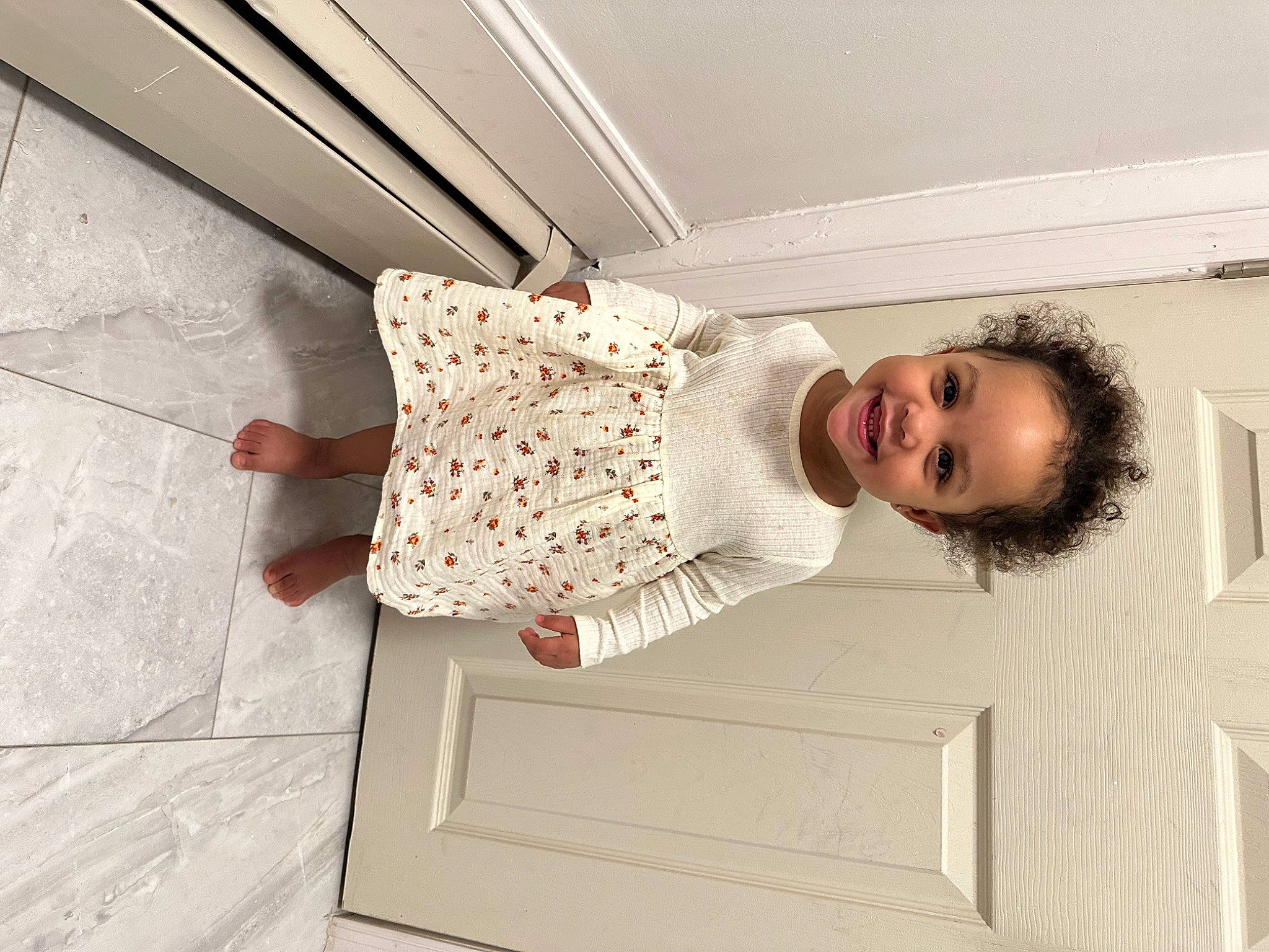 Alyssa joined the competition — help win amazing prizes! baby_toddler_clothing, ceiling, child, elbow, floor, flooring, happy, hardwood, home_door, interior_design, joy, pattern, person, rectangle, room, sleeve, smile, stairs, standing, toddler