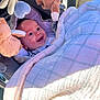 Maël a rejoint le concours — aidez-le/la à gagner de superbes lots ! baby, blanket, stroller, plush_toy, smile, happy, infant, child, face, outdoor, sunlight, clothing, head, cute, soft_toy, baby_carrier, warm, comfort, portrait, playful