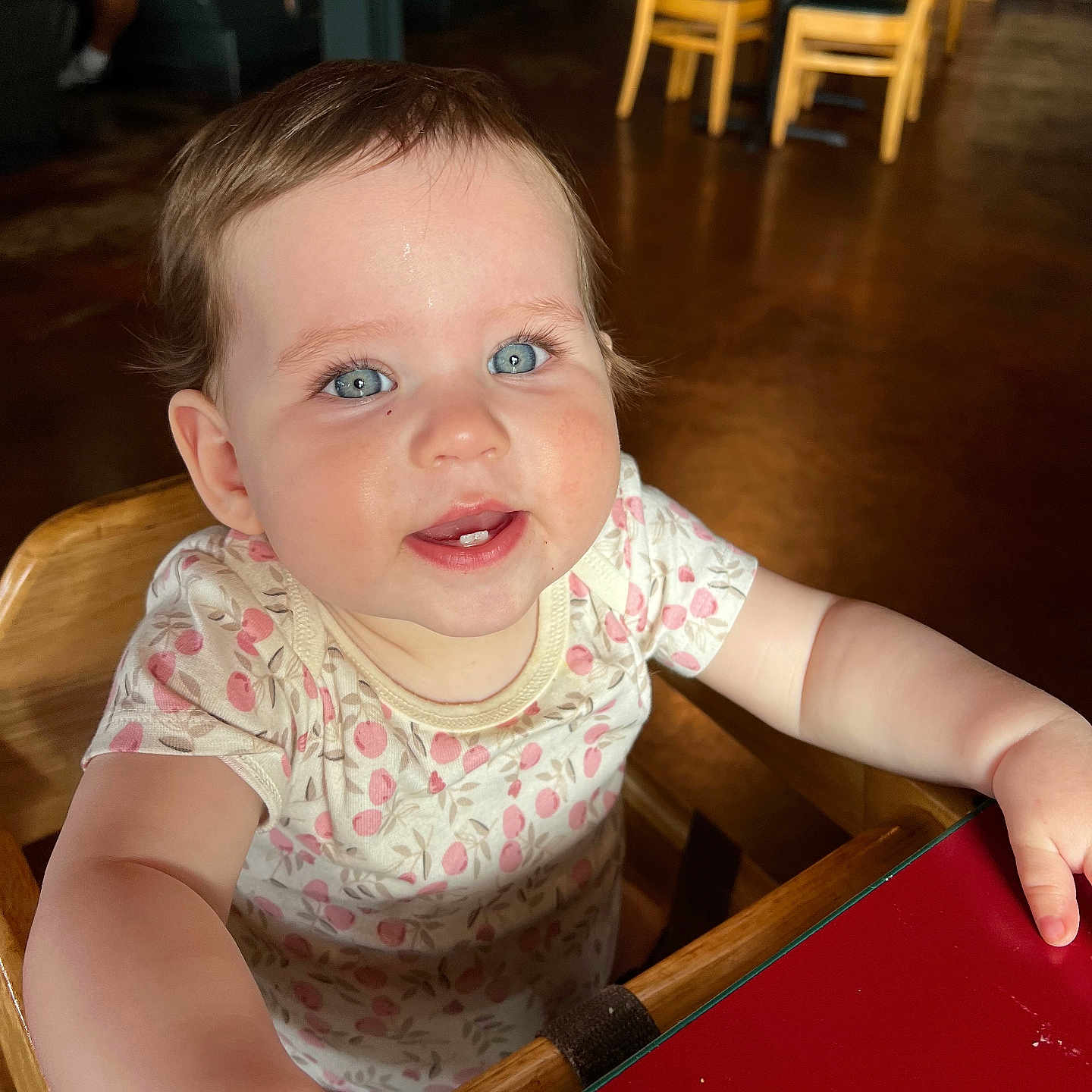 Scarlett is registered to the contest to win money with this photo: adult, baby, bodypart, chair, diningtable, face, finger, furniture, hand, hardwood, head, indoors, male, man, person, photography, plywood, portrait, table, wood