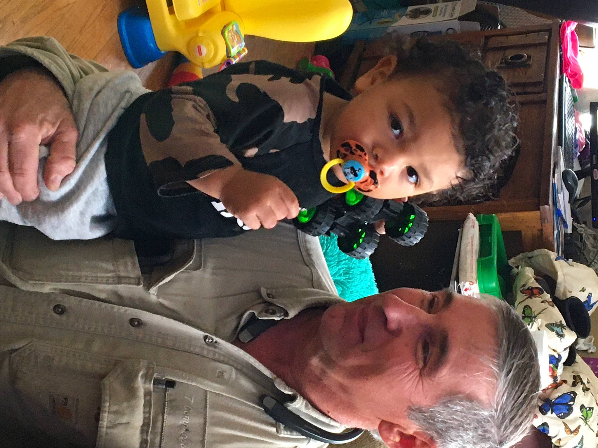 Liam is registered to the contest to win money with this photo: baby, baby_products, child, event, eyewear, facial_expression, fun, hairstyle, happy, human, leisure, mouth, organ, person, photograph, product, skin, toddler, tradition, yellow