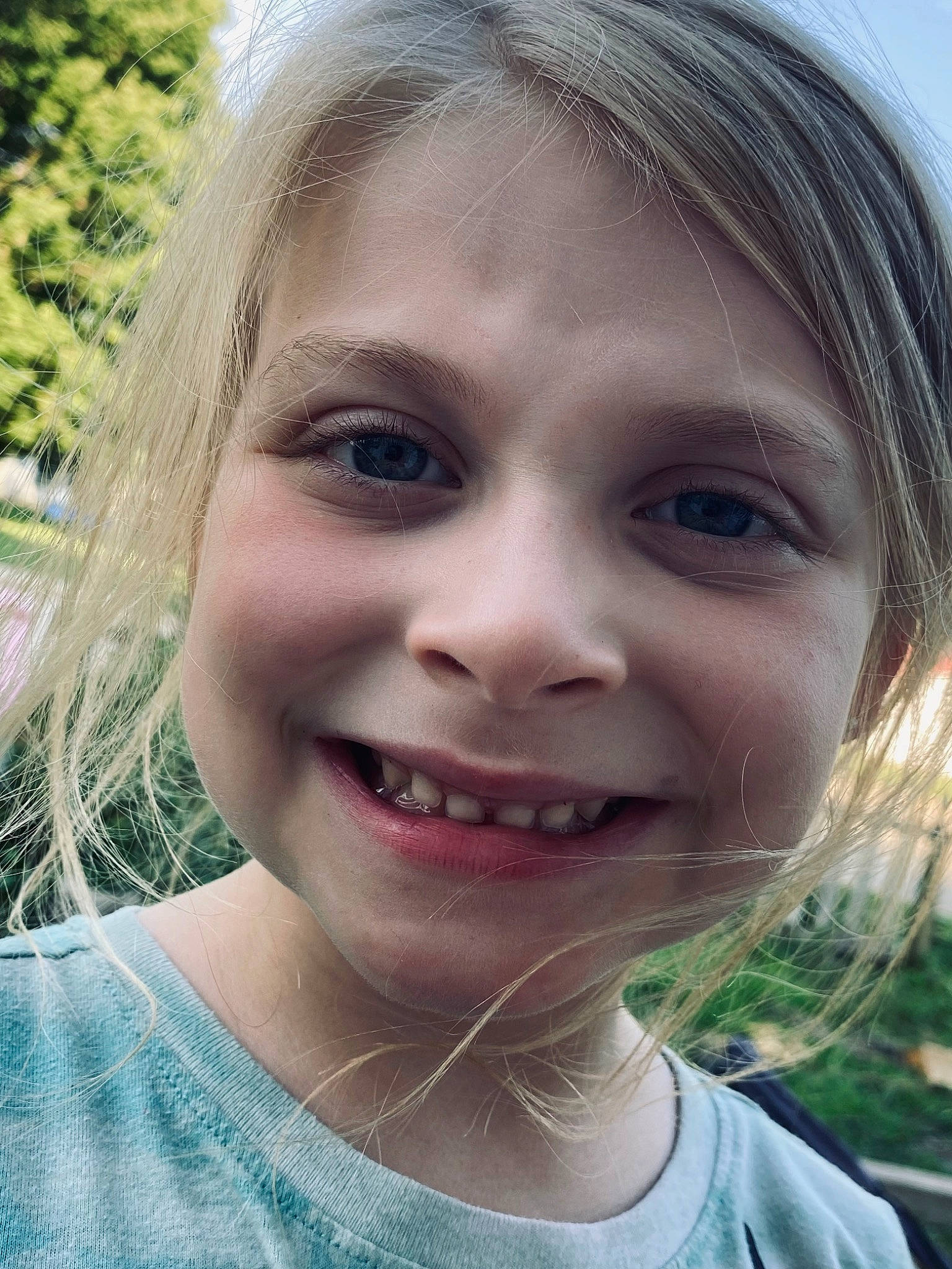 Alaina is registered to the contest to win money with this photo: chin, eye, eyebrow, eyelash, facial_expression, fun, grass, happy, human, iris, jaw, joy, lip, nose, organ, people_in_nature, person, photograph, skin, smile