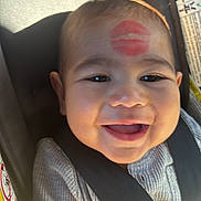 Angel joined the competition — help win amazing prizes! baby, car_seat, smile, face, child, sunlight, seatbelt, clothing, happy, infant, lipstick_mark, cute, portrait, seat, safety, infant_clothing, closeup, child_in_car, baby_girl, baby_boy