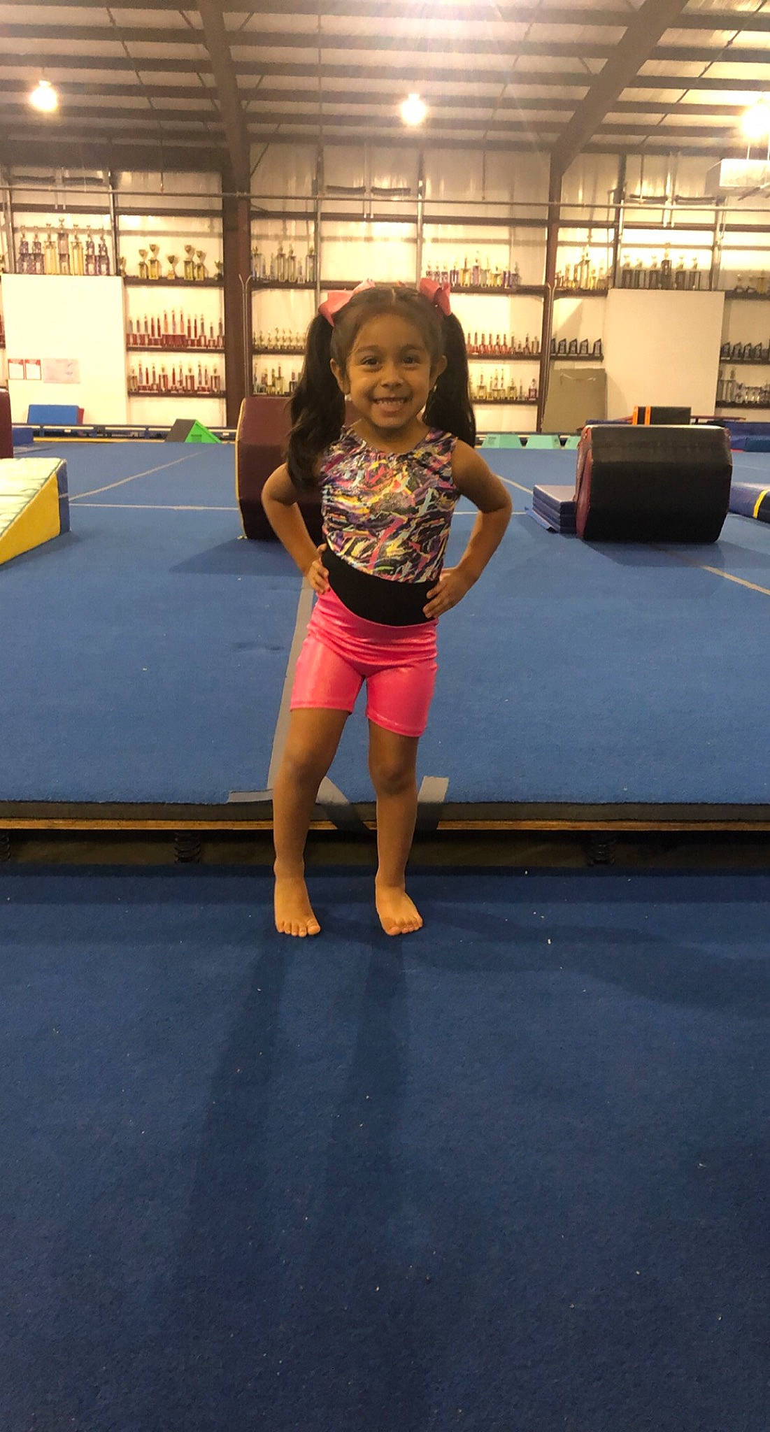 Cecelia is registered to the contest to win money with this photo: artistic_gymnastics, barefoot, dance, entertainment, floor, flooring, fun, gymnastics, joy, knee, leg, leisure, performing_arts, person, physical_fitness, shorts, shoulder, sports, sportswear, thigh