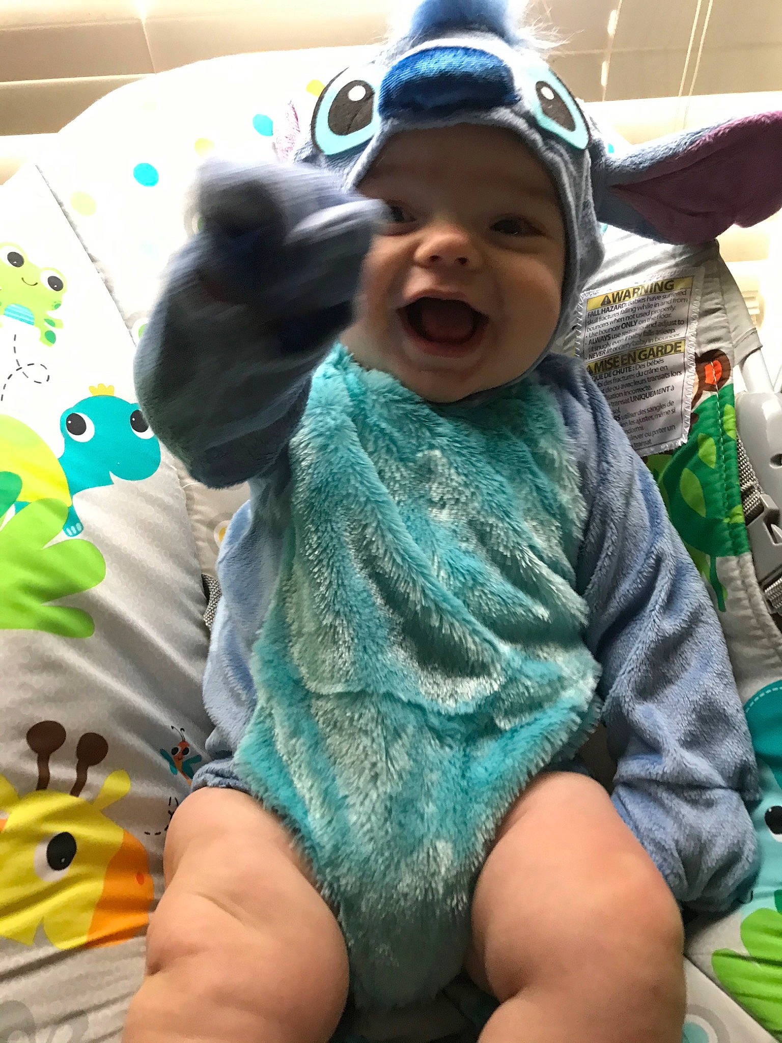 Karsen joined the competition — help win amazing prizes! baby, child, cool, electronic_device, green, head, leg, outerwear, person, sitting, skin, smile, technology, toddler