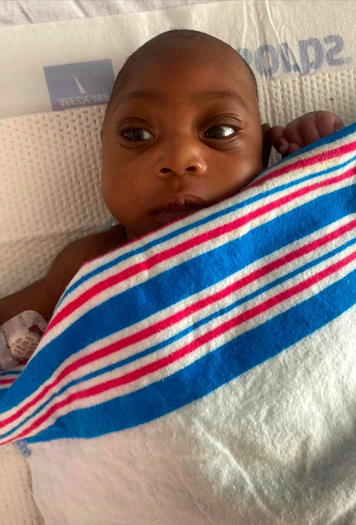 Maloni is registered to the contest to win money with this photo: baby, baby_products, bedding, blanket, child, cloud, comfort, fun, happy, linens, nose, pattern, person, room, selfie, skin, t_shirt, toddler, vacation, wood