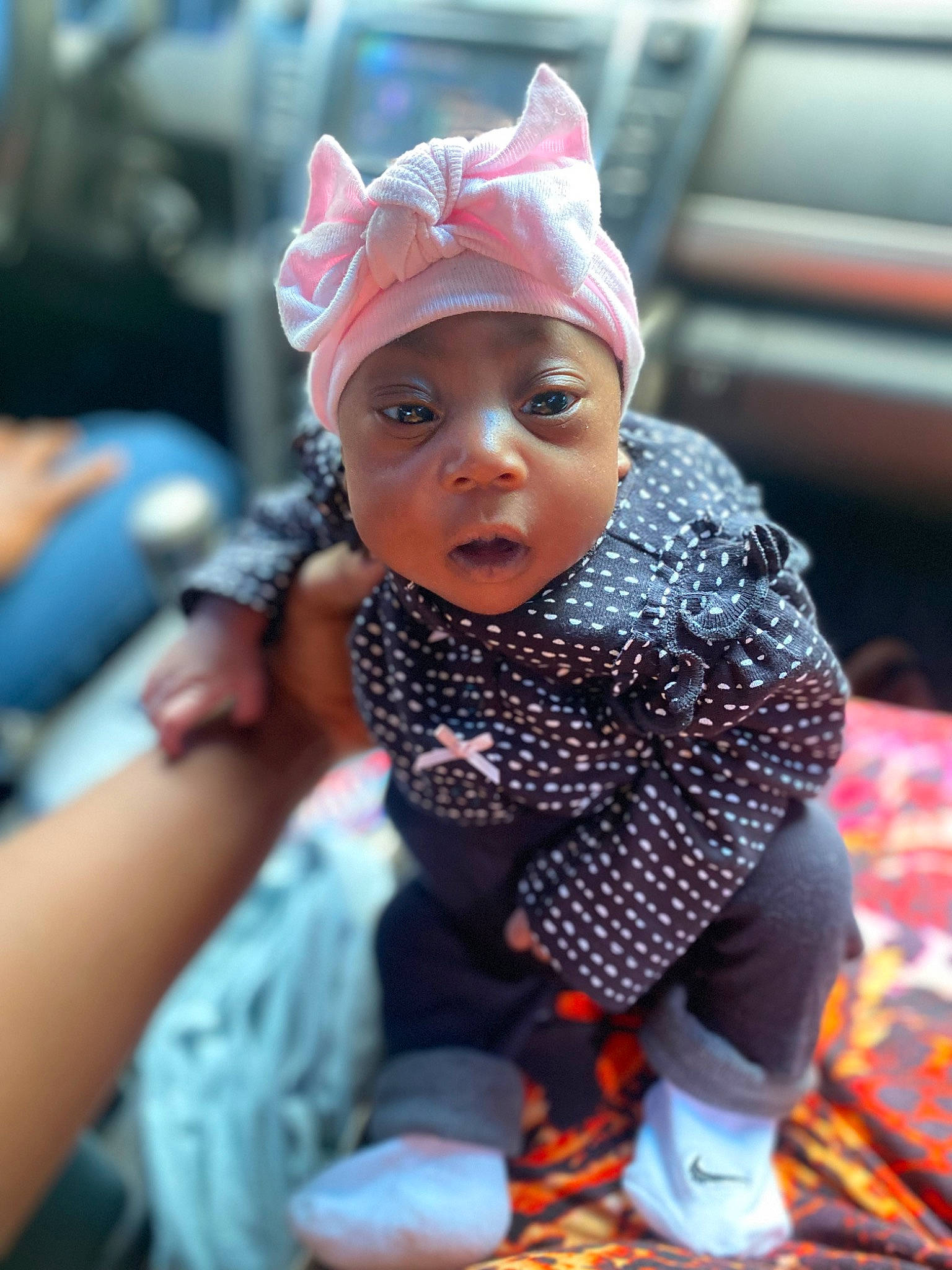 Maloni joined the competition — help win amazing prizes! baby, baby_toddler_clothing, beanie, cap, child, doll, event, eye, fashion_accessory, fun, happy, headwear, jewellery, pattern, person, play, purple, sitting, toddler, toy