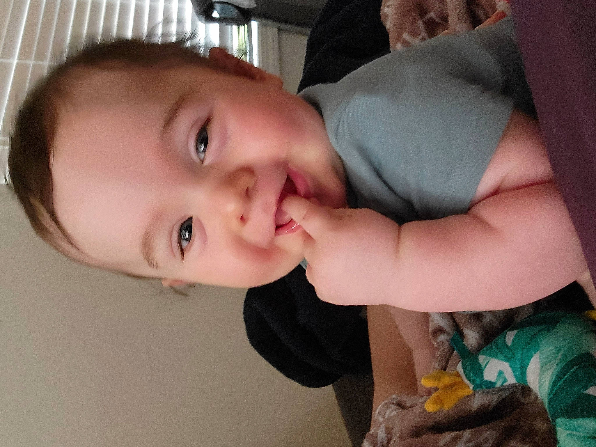Lawson is registered to the contest to win money with this photo: baby_toddler_clothing, cheek, dress, eye, eyebrow, eyelash, finger, gesture, hand, happy, iris, joy, lip, mouth, neck, nose, person, skin, sleeve, smile