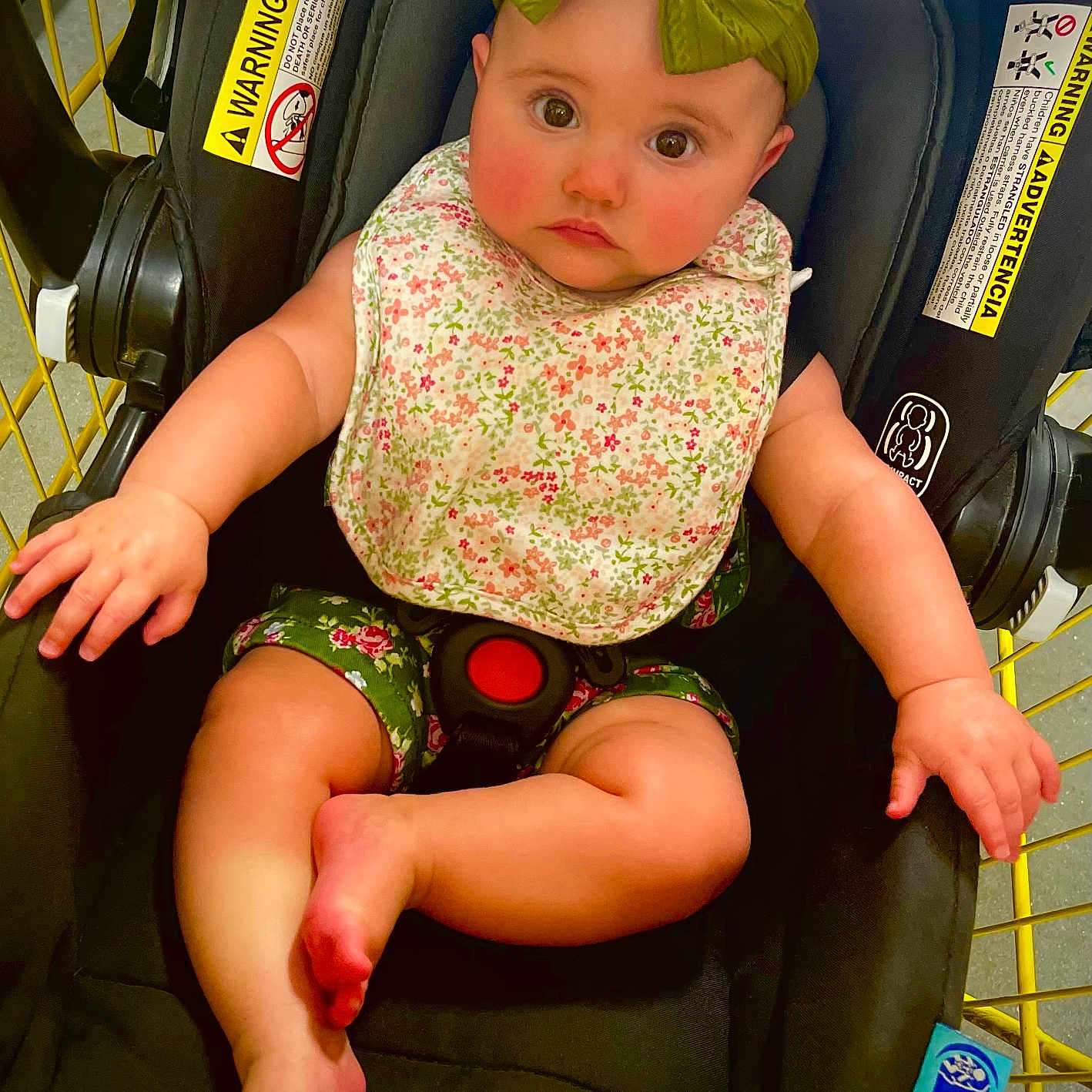 Eva is registered to the contest to win money with this photo: baby, bodypart, car, car_interior, carseat, clothing, face, finger, furniture, hand, hat, head, homedecor, person, photography, portrait, sitting, t_shirt, transportation, vehicle