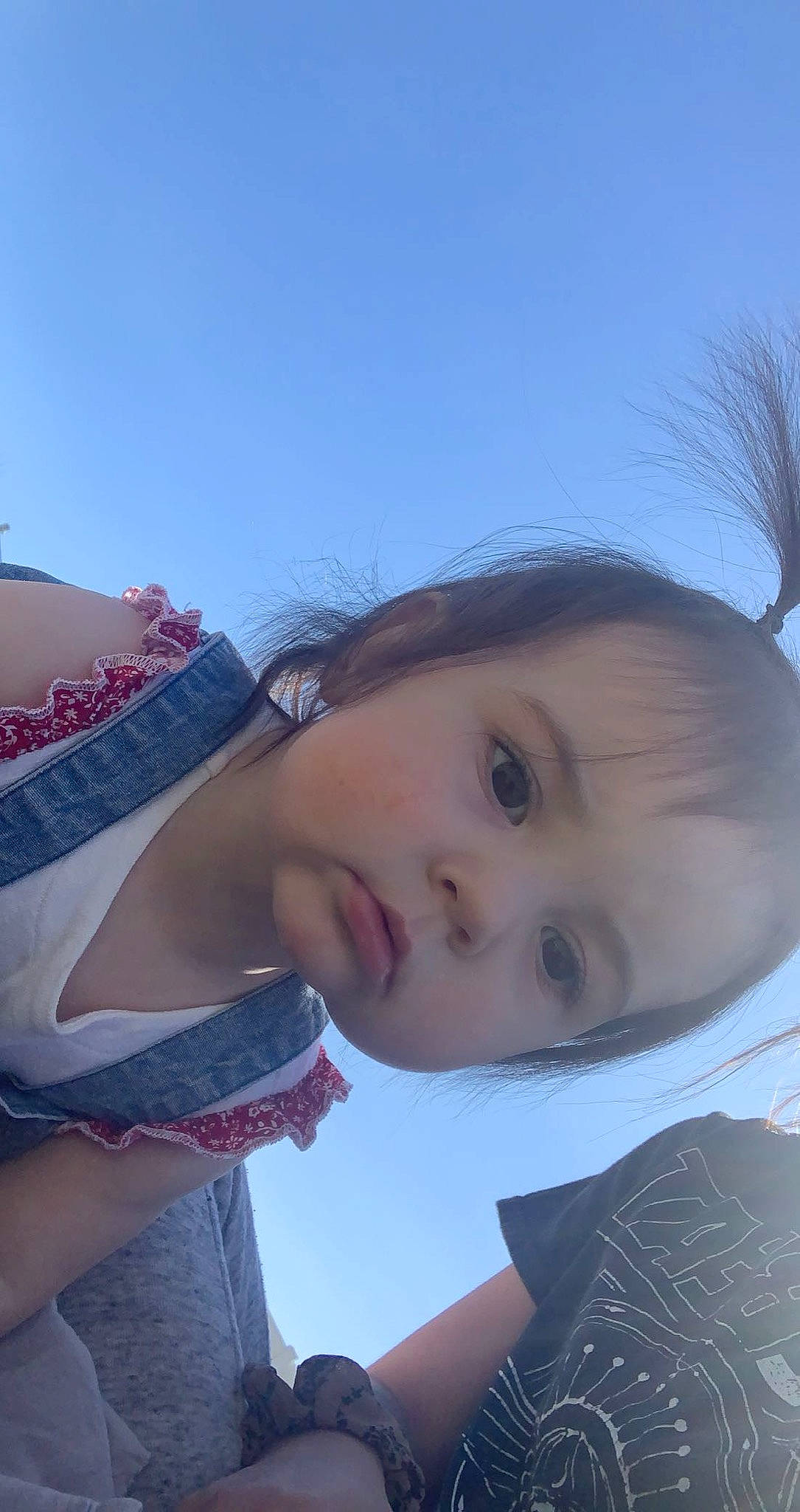 Indie is registered to the contest to win money with this photo: azure, beauty, black_hair, cheek, chin, electric_blue, eyebrow, eyelash, fun, grass, happy, iris, leisure, lip, mouth, nose, person, skin, sky, sunlight