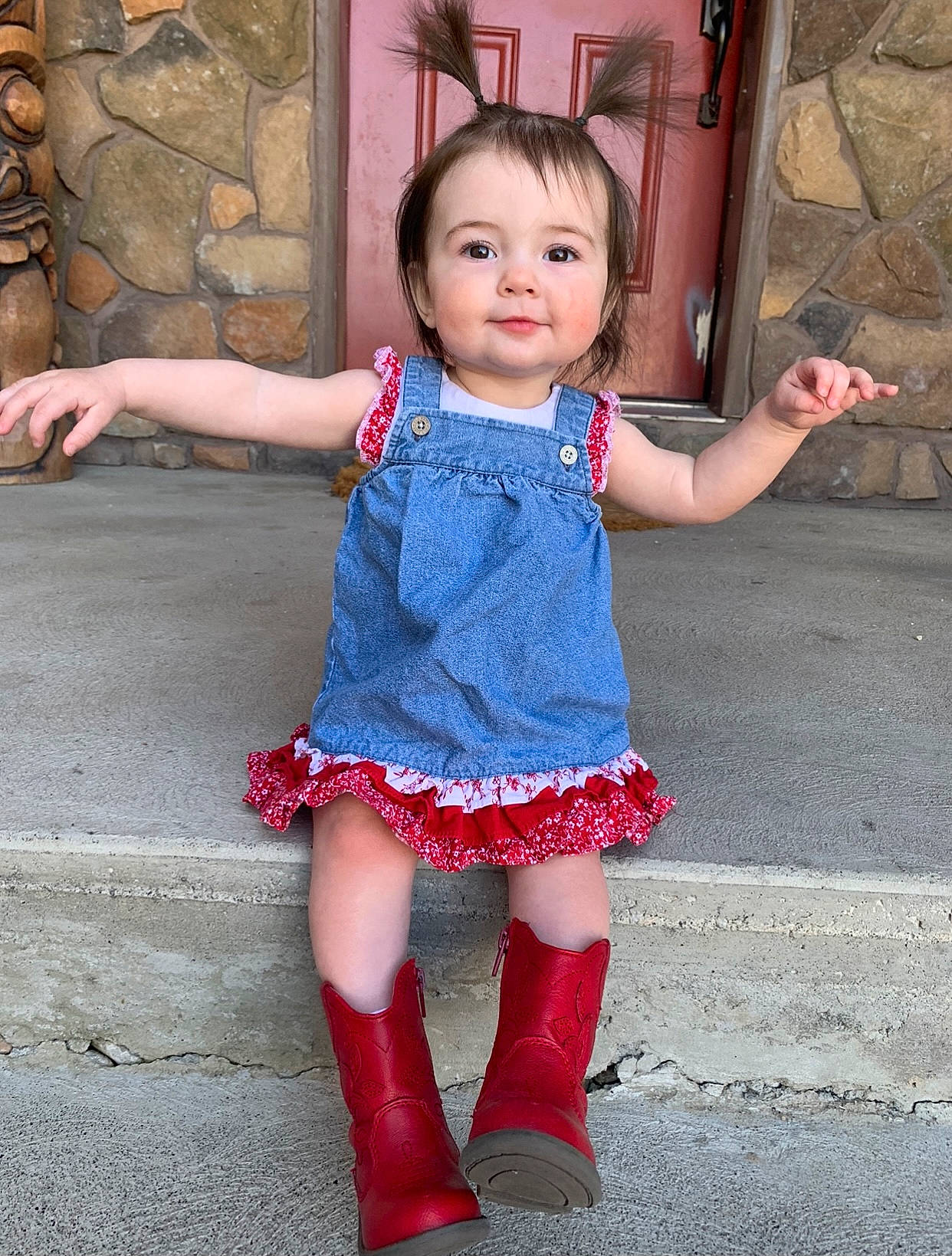 Indie is registered to the contest to win money with this photo: baby_toddler_clothing, cool, face, hairstyle, happy, head, human_body, joint, joy, lip, neck, outerwear, person, pink, red, shoulder, skin, sleeve, smile, standing