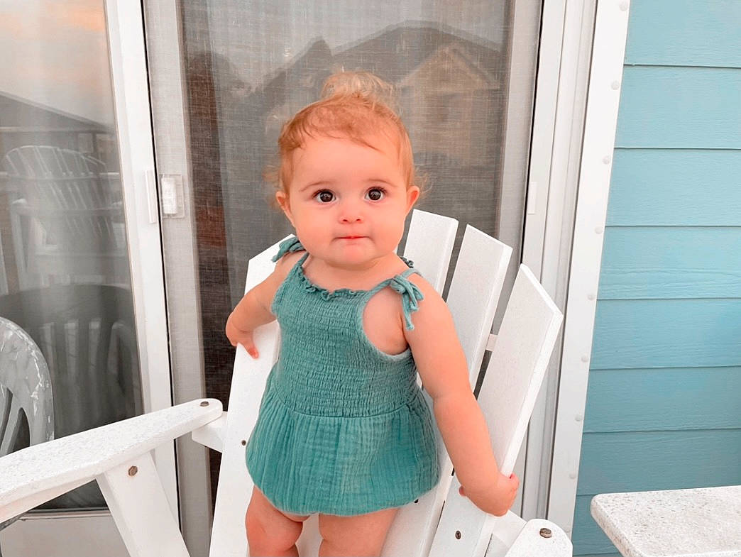 Everleigh Rose joined the competition — help win amazing prizes! baby, baby_toddler_clothing, chair, child, doll, dress, eyelash, hairstyle, happy, human_leg, joint, person, pink, shoulder, skin, sleeve, thigh, toddler, toy, trunk