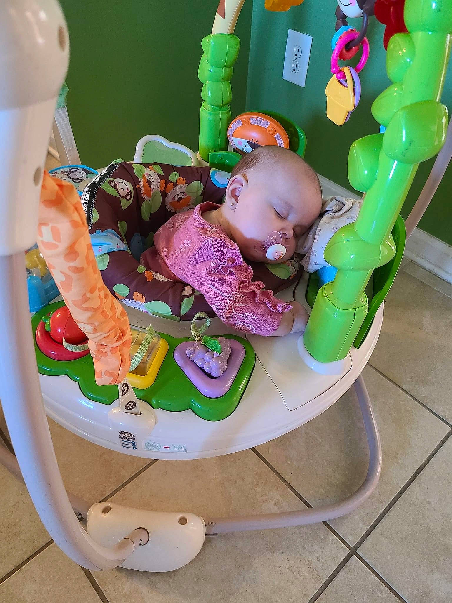 Charli Rose is registered to the contest to win money with this photo: baby, baby_mobile, baby_playing_with_toys, baby_products, baby_safety, baby_toddler_clothing, baby_toys, comfort, cradle, green, infant_bed, laundry_room, nursery, person, play, product, room, shelf, sitting, toddler