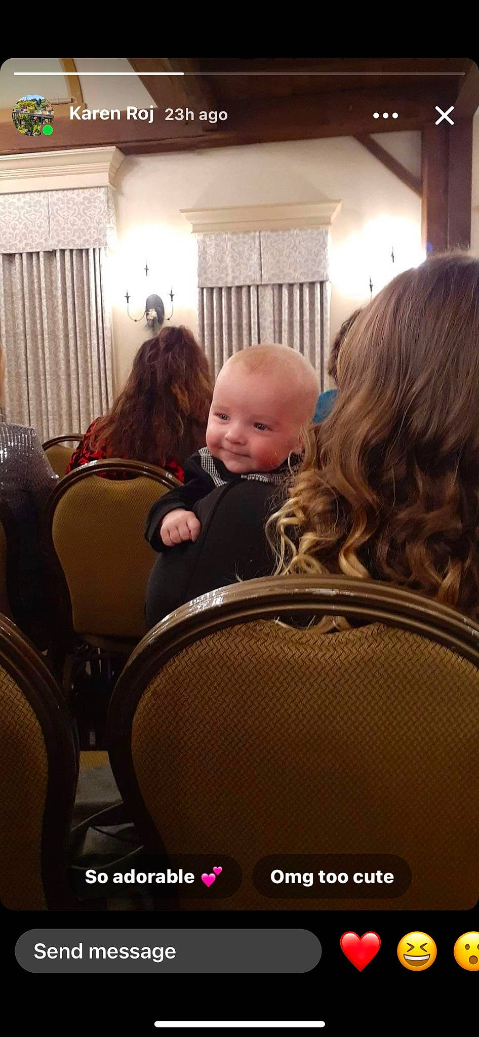 Everett is registered to the contest to win money with this photo: baby, blond, chair, child, comfort, conversation, curtain, event, flooring, fun, hair, hairstyle, happy, interaction, luxury_vehicle, motor_vehicle, person, room, sitting, suit