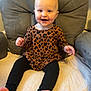 baby, chair, clothing, couch, cushion, face, footwear, furniture, happy, head, homedecor, hosiery, jeans, pants, person, photography, portrait, shoe, sitting, sock