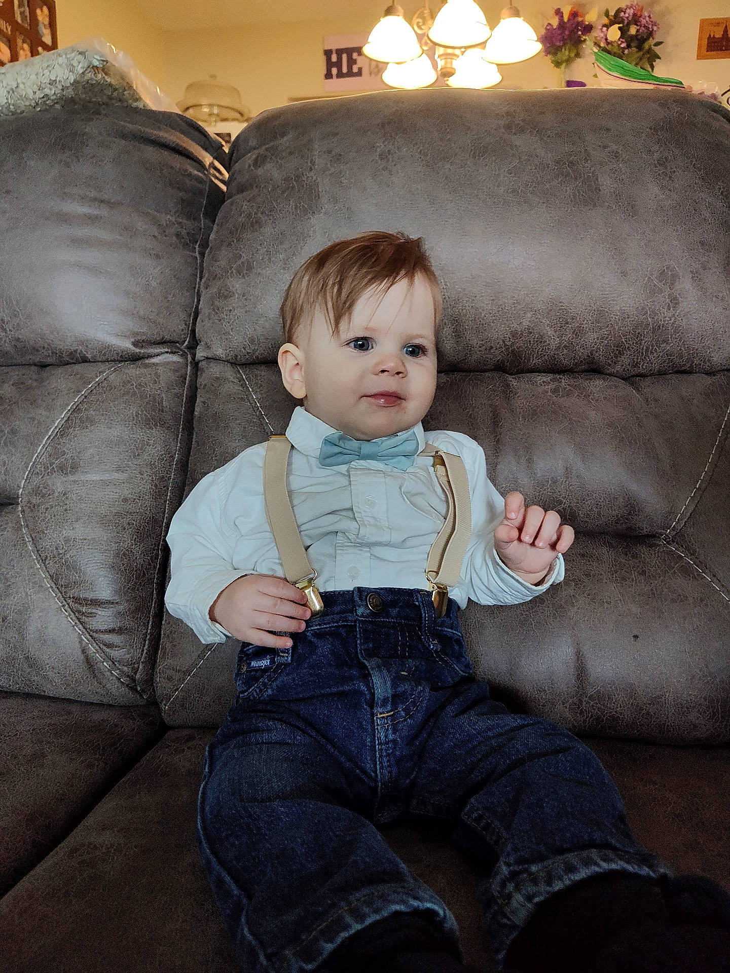 Jeffrey is registered to the contest to win money with this photo: accessories, architecture, baby, bodypart, building, chair, clothing, couch, face, finger, formalwear, furniture, hand, head, indoors, jeans, pants, person, suspenders, tie