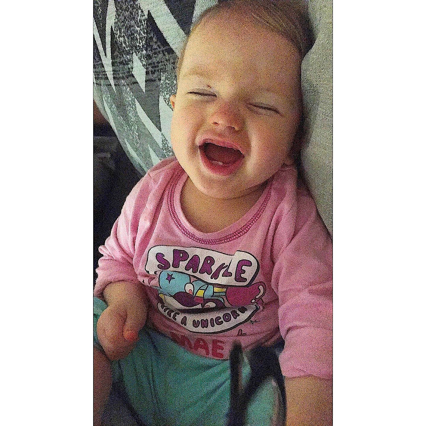 Isla-mae is registered to the contest to win money with this photo: baby, cheek, child, chin, cool, face, facial_expression, forehead, hair, head, nose, organ, people, person, pink, selfie, skin, smile, t_shirt, toddler