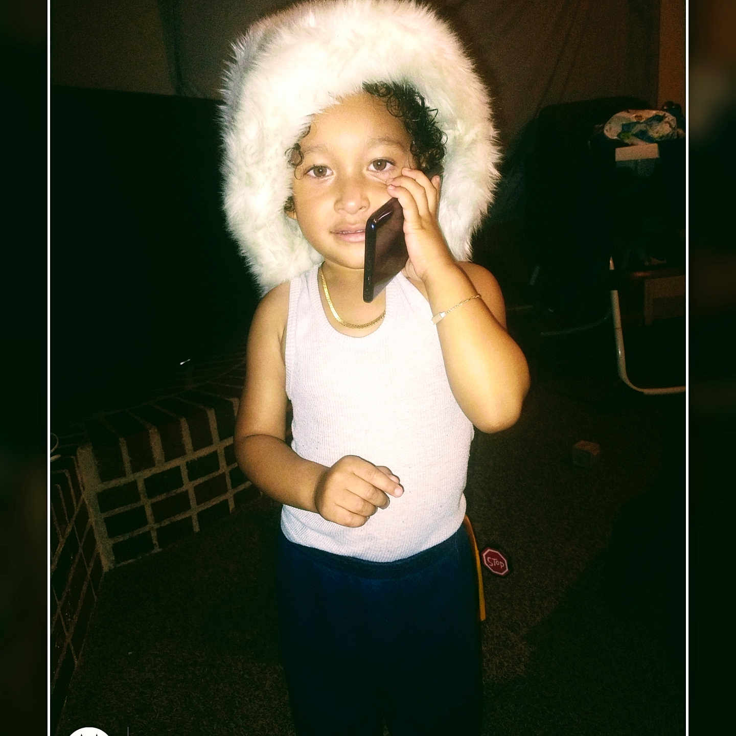 Sir'Royalty is registered to the contest to win money with this photo: accessories, bodypart, bonnet, child, clothing, electricaldevice, electronics, face, female, finger, girl, hand, hat, head, microphone, mobilephone, person, phone, photography, portrait