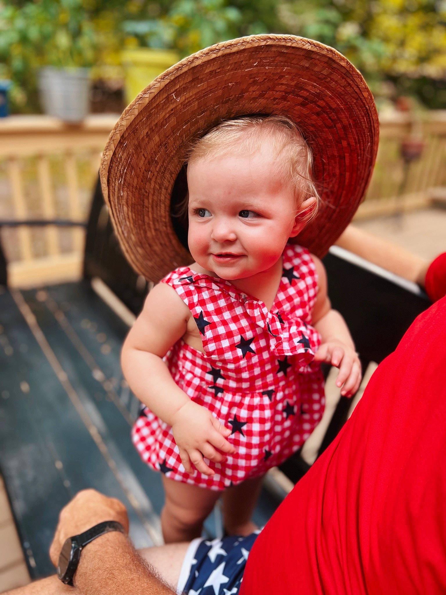 Isabel is registered to the contest to win money with this photo: baby, baby_toddler_clothing, child, chin, dress, eye, face, fun, grass, happy, hat, head, human_body, leisure, lip, pattern, person, smile, sombrero, sun_hat