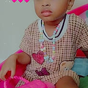 Daniya joined the competition — help win amazing prizes! accessories, bows, child, colorful, curly_hair, cute, dress, expression, girl, hearts, indoor, necklace, pigtails, pink_purse, playful, portrait, seated, toddler, toy, young_child