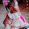 Daniya is registered to the contest to win money with this photo: braids, child, curious, cute, dress, emojis, floor_tiles, floral_pattern, girl, hair_bow, indoor, pink, playful, portrait, side_profile, sitting, text_overlay, toddler, toy_car, young_child
