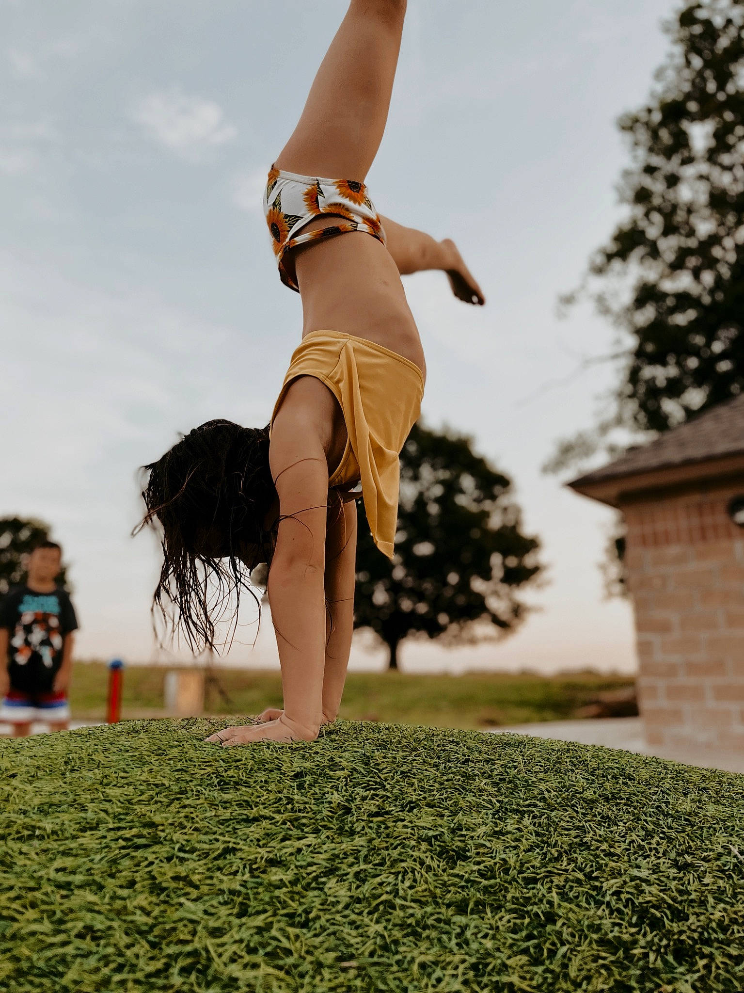 Haddie is registered to the contest to win money with this photo: balance, cloud, flash_photography, freestyle_walking, fun, grass, happy, human_body, human_leg, knee, leg, leisure, people_in_nature, person, recreation, sky, standing, thigh, tree, trunk
