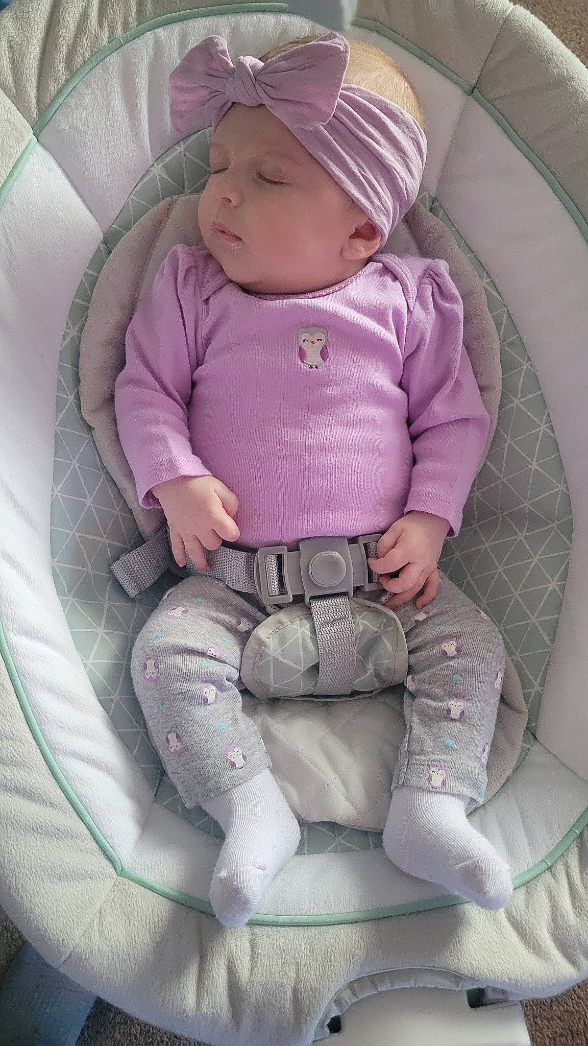 Elliana is registered to the contest to win money with this photo: baby, baby_carriage, baby_products, baby_toddler_clothing, cap, car_seat, cheek, child, comfort, head, headwear, knee, leg, magenta, person, pink, product, purple, sitting, sleeve