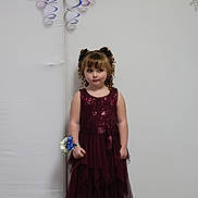 Kandaisey joined the competition — help win amazing prizes! child, girl, dress, maroon, curly_hair, ribbons, corsage, boots, black_bows, snowflake_decorations, indoor, portrait, standing, floor, wall, happy, fashion, event, celebration, cute