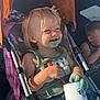 toddler, child, stroller, smiling, blue_stain, sunlight, cup, straw, casual_clothing, jeans, tank_top, outdoor, happy, messy, sitting, person, baby, hair, face, playful