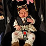 Ayla-May joined the competition — help win amazing prizes! baby, car_seat, infant, sleeping, headband, boots, floral_pattern, plush_toys, straps, clothing, cute, child, indoors, soft_toys, safety, comfort, portrait, resting, leopard_print, newborn
