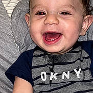 Marcel Demeter joined the competition — help win amazing prizes! baby, babylaughing, bodypart, clothing, couch, cushion, face, furniture, happy, head, homedecor, laughing, mouth, person, photography, portrait, smile, t_shirt, teeth