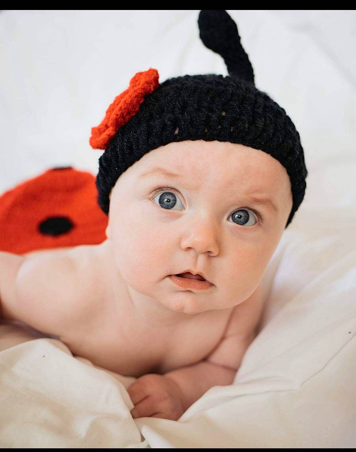 Aurora Rose is registered to the contest to win money with this photo: baby, beanie, cap, cheek, child, costume, costume_accessory, ear, head, headgear, knit_cap, lip, nose, person, skin, toddler, wool
