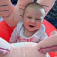 Elodie joined the competition — help win amazing prizes! baby, child, clothing, comfort, cushion, cute, expression, fabric, face, happy, head, indoors, infant, joy, person, pink, plush, seated, smiling, soft_toys