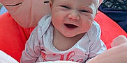 Elodie joined the competition — help win amazing prizes! baby, child, clothing, comfort, cushion, cute, expression, fabric, face, happy, head, indoors, infant, joy, person, pink, plush, seated, smiling, soft_toys
