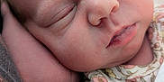 Elodie is registered to the contest to win money with this photo: baby, child, closeup, cute, expression, face, floral_clothing, hand, human, infant, newborn, newborn_baby, peaceful, portrait, relaxation, rest, skin, sleeping, soft, toddler