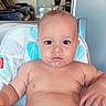 Nicolas joined the competition — help win amazing prizes! baby, infant, child, high_chair, sitting, portrait, face, eyes, looking_at_camera, serious_expression, food, messy_face, diaper, bare_chested, indoor, home, chair, window, sunlight, photography